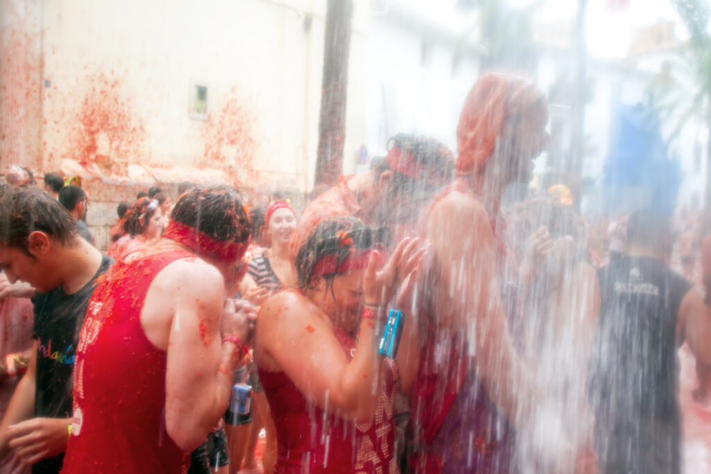 Get ready for a journey through Spain's famous La Tomitina Festival. Dive into the tomato-splattered chaos and immerse yourself in this exhilarating celebration of food, fun, and tradition.